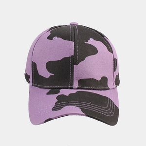 Detailed view of purple and black camouflage baseball cap with six-panel construction