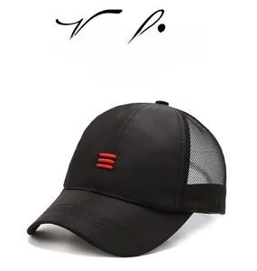 Close-up of black mesh baseball cap with red embroidered stripes and breathable fabric
