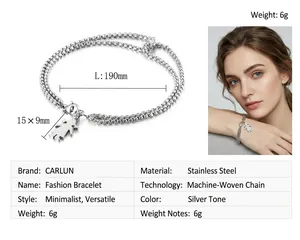 Detail view of a double-layered stainless steel chain bracelet with a girl pendant