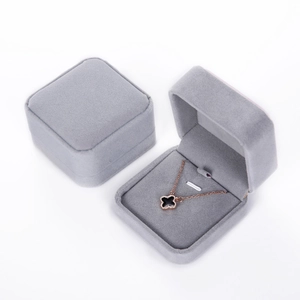 Elegant gray velvet jewelry gift box showing closed view and necklace display case