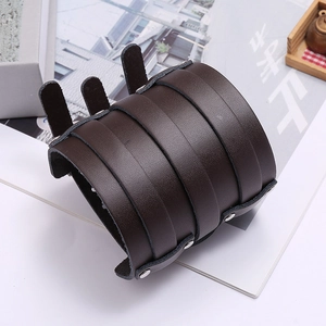 Detail view of deep brown multi-layer punk leather bracelet with silver metal rivets