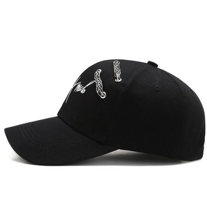 Black cotton canvas baseball cap featuring side white embroidery and silver metal chains
