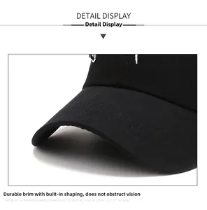 Detail of black baseball cap brim with multi-row stitching and reinforced inner structure