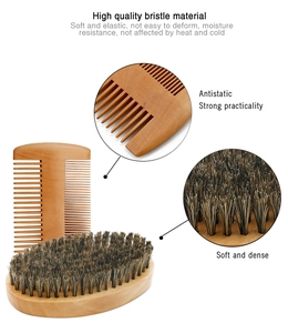 Detail view of high quality bristle beard brush and double sided wood comb set