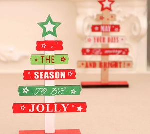 Detail of wooden mini Christmas tree desktop decor with The Season To Be Jolly text