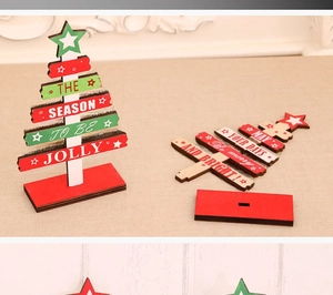 Detail of DIY wooden Christmas tree decor showing assembly parts and festive holiday greetings