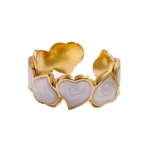 Golden titanium steel open ring with white enamel heart-shaped charm and adjustable band