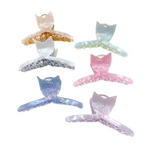 Elegant frosted fishtail hair claws in multiple pearlescent colors on white background