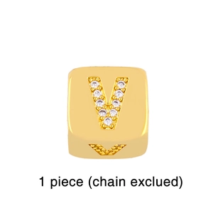 Detail of gold square letter V charm featuring micro-set sparkling crystals