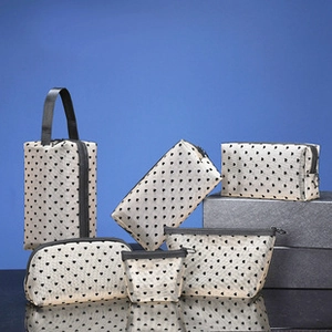 Six-piece set of portable nylon mesh cosmetic bags with heart pattern and carry handles
