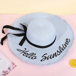 Blue wide brim straw sun hat featuring Hello Sunshine embroidery and black silk ribbon bow