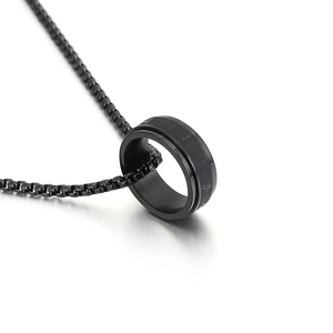 Black rotating stainless steel spinner ring necklace with Sanskrit mantra engraving