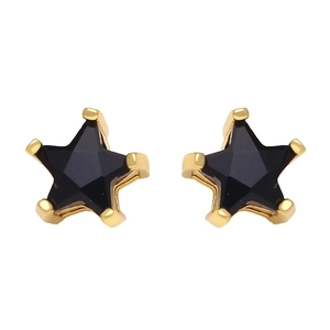 Macro shot of minimalist star earrings with black inlay and golden finish details
