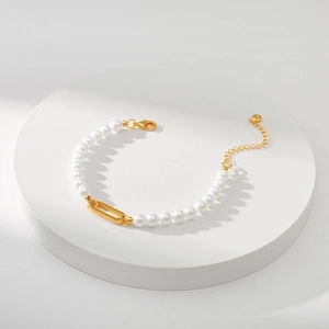 French vintage handmade pearl bracelet with 18K gold plated rectangular metal accents
