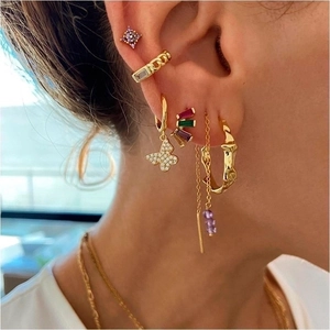 Bohemian gold plated earrings set with colorful cubic zirconia and butterfly charms