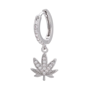 Macro shot of silver maple leaf hoop earrings featuring micro-pave cubic zirconia stones