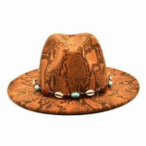 Close-up of wide brim fedora featuring snakeskin texture and turquoise shell hatband