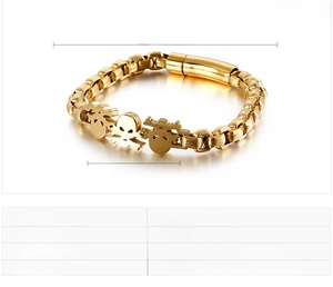 Detail view of gold stainless steel skull biker bracelet with 220mm length specifications