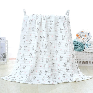 Close-up of soft six-layer cotton gauze baby blanket with cute rabbit print texture
