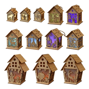 Lighted wooden Christmas cabin ornaments set with reindeer and Santa laser-cut designs