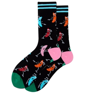 Detail view of black cotton socks featuring colorful cartoon chili pepper knit patterns
