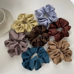 Set of seven high-quality silk satin hair scrunchies in elegant French style colors
