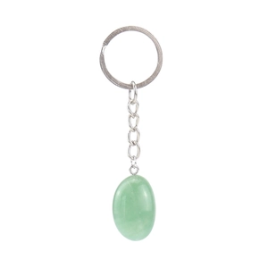 Macro detail of oval green natural agate stone keychain with silver metal chain on white