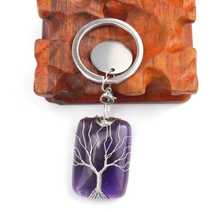 Handmade rectangular purple crystal stone keychain with silver Tree of Life wire wrap