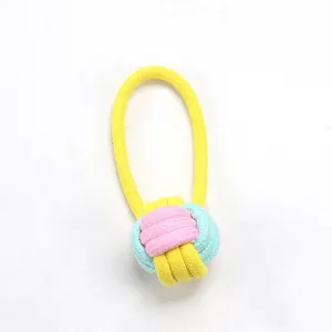 Durable cotton rope dog toy with pink blue and yellow woven ball and handle for teething