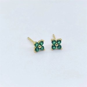Detailed view of S925 sterling silver four-leaf clover earrings with green zircon stones