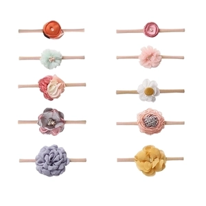 Set of 10 soft nylon baby headbands with colorful handmade silk floral decorations