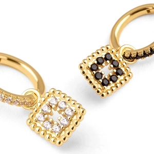 Gold-plated geometric earrings with black and white zircon stones in square frames