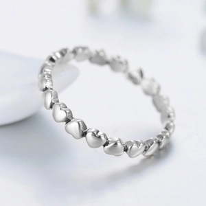 Elegant s925 silver minimalist stackable heart ring with a polished metallic finish