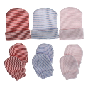 Close-up of three pairs of striped cotton newborn hats and anti-scratch mittens set