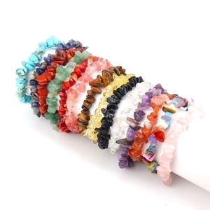 Detailed view of elastic bracelets set featuring natural amethyst and assorted gemstones