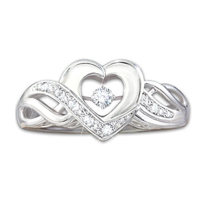 Prachtige zilverkleurige ring met hart, oneindigheidssymbool en fonkelende zirkonia's