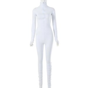 Detail of white long sleeve bodysuit with zipper neckline and ruched sleeve thumbholes