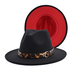 Black wool fedora hat with red brim underside and leopard print band with silver buckle