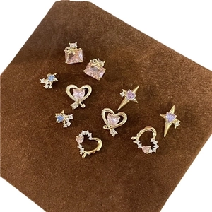 Selection of gold-plated heart and star clip-on earrings with colorful zircon stones