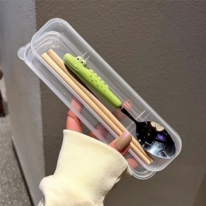 Portable stainless steel cutlery set with cute green crocodile handles and storage case