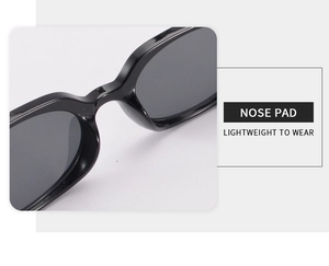 Detailed view of integrated nose pads and sleek black frame for lightweight sunglasses