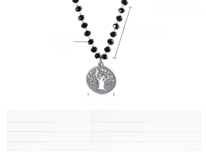 Detail of tree of life pendant with black crystal beads on a stainless steel necklace