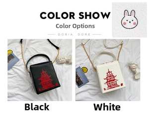 Black and white crossbody box bags with red pagoda print and gold chain strap detail