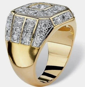 Macro shot of gold-plated hip hop ring featuring a square center stone and zircon pavé