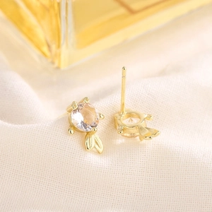 Elegant gold koi fish stud earrings with sparkling cubic zirconia and polished details