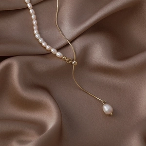Baroque freshwater pearl and gold snake chain necklace with adjustable slider clasp