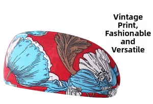 Macro view of wide elastic sports headband with red and blue vintage floral pattern print