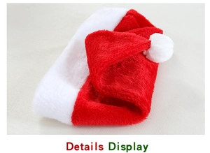 Close-up of classic red and white plush Christmas hat fabric texture and fluffy pompom