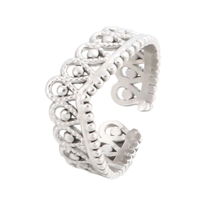Detailed macro view of silver hollow crown ring with adjustable band and bead accents