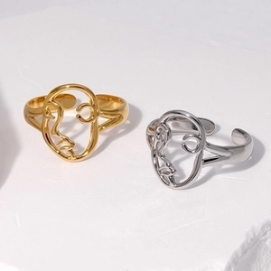 Abstract face line art ring in gold and silver finish with adjustable open band